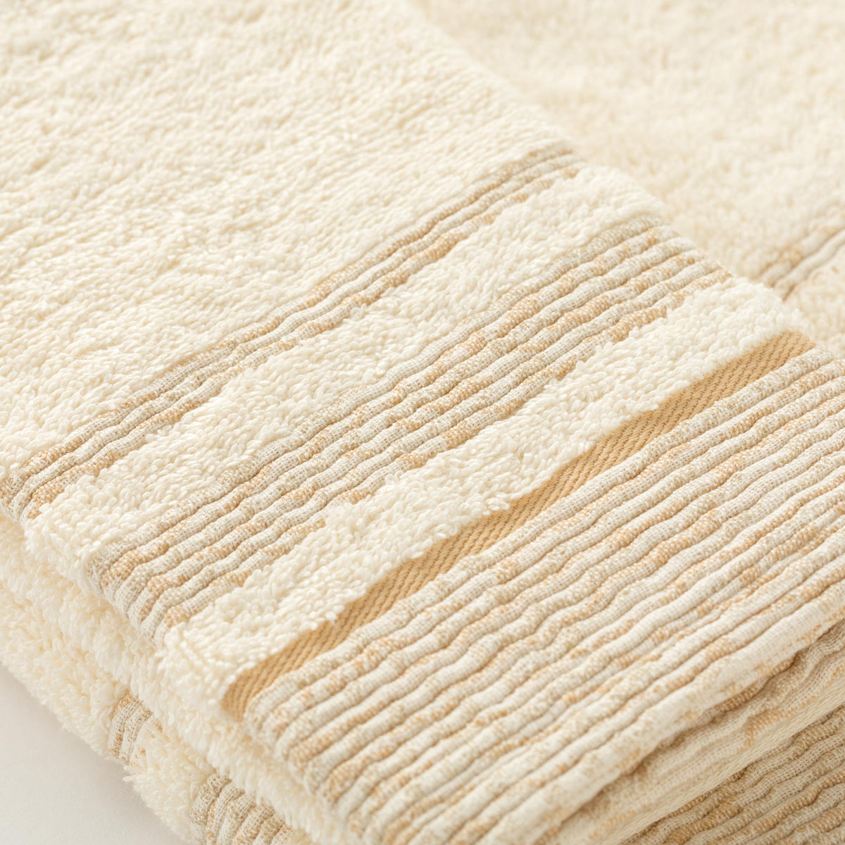 Set Asciugamani 1+1 In Spugna Con Bordura Jacquard Olimpia Linea Oro