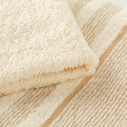 Set Asciugamani 1+1 In Spugna Con Bordura Jacquard Olimpia Linea Oro